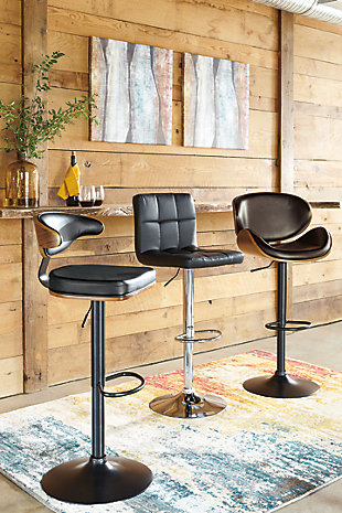 This upholstered swivel bar stool is ultra-contemporary style with a twist. Chrome-tone metal base is a sleek complement to the tailored cushioned seat with faux leather upholstery and squared tufting.360-degree swivel | Chrome-tone tubular metal base | Cushioned seat with faux leather upholstery | Adjustable height (moves from counter to pub height) | Footrest and weighted pedestal base | Assembly required | Excluded from promotional discounts and coupons | Estimated Assembly Time: 15 Minutes