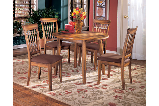 The Berringer dining room table incorporates decidedly rustic flair. Two drop leaves provide just enough table space to accommodate the drop-in guest. Simple and clean lined, with stylish stilted legs, it’s a look that easily fits, whether your aesthetic is vintage, country or traditional.Made of veneers, wood and engineered wood | Hinged extension leaves | Seats up to 4 | Assembly required | Dining chairs sold separately | Estimated Assembly Time: 15 Minutes