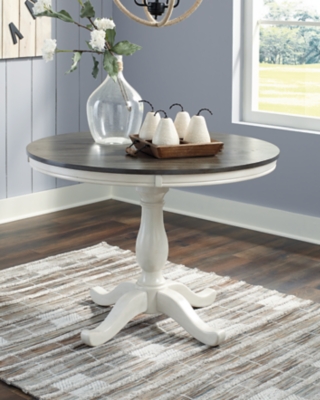 Nelling Round Dining Table with Pedestal Base | Ashley