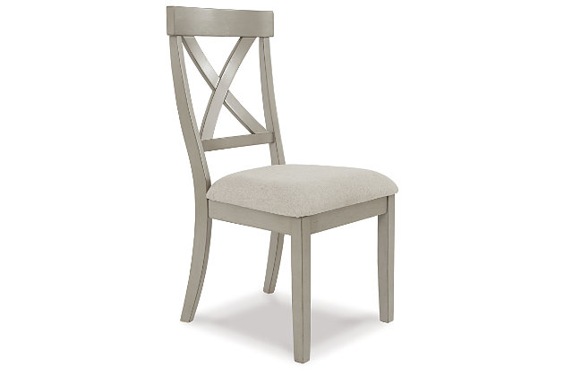 Bring a relaxed yet refined sense of good taste to a space with the Parellen dining chair. Clean-lined frame sports a gray finish that’s so easy on the eyes. Covered in a complementary textured beige fabric, the chair’s cushioned upholstered seat goes easy on the body. And with classic X-back styling, this chair is an inspired choice for modern farmhouse living.Made of wood | Light beige woven polyester upholstery and gray finish | X-back design with tapered legs | Assembly required | Estimated Assembly Time: 15 Minutes