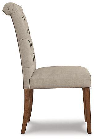 Simple sophistication is closer than ever with the Harvina dining chair. This chair is delightfully cozy with its beige upholstered seat and carefully tailored button-tufted back, while the rolled top rail provides a little extra flair. The legs are finished in a neutral light walnut color for the finishing touch to this charming chair.Made with solid wood | Legs finished in neutral light walnut color | Beige textured polyester upholstery | Button-tufted back and rolled top rail | Assembly required | Estimated Assembly Time: 30 Minutes