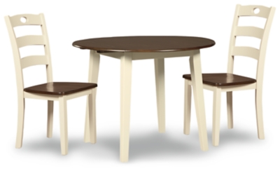 Ashley furniture round discount dining table set