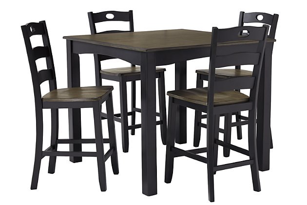 With its unique blend of soft black with grayish brown, the Froshburg 5-piece square counter height table set serves up cottage-chic style with sophistication. Four pierced ladderback bar stools elevate a classically charming scene that’s sure to satisfy for years to come.Includes counter height table and 4 bar stools | Made of veneers, wood and engineered wood | Two-tone finish | Assembly required | Estimated Assembly Time: 90 Minutes