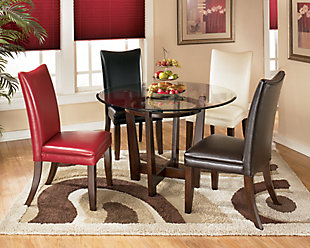 Dinner and a show are best served from the Charrell dining table. Thick beveled glass shows off the table's unique intersectioned base. Envision it in a dining room, kitchen or family game room.Assembly required | Made of veneers, wood, engineered wood and glass | Clear glass tabletop | Dining chairs sold separately | Estimated Assembly Time: 15 Minutes