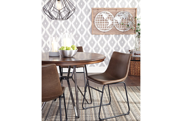 With its distinctive tubular metal base, the Centiar dining table set serves up a fresh twist on mid-century inspired style. The mixed materials and two-tone aesthetic are beautifully in balance. What a timeless look for eat-in kitchens and casually cool dining rooms.Includes dining table and 4 dining chairs | Tabletop made with mindi veneer and engineered wood | Metal table base with brushed dark bronze-tone finish | Bar stools with tubular metal base, bucket seat and faux leather upholstery | Assembly required | Estimated Assembly Time: 150 Minutes