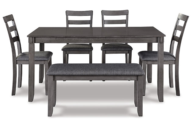 It’s so easy being gray—at least the Bridson 6-piece dining set makes it seem that way. This transitional dining table set sports a charcoal gray finish with textured gray upholstery for an on-trend and relevant appeal. Plushly upholstered seat cushions in a practical polyfiber make it a pleasure to linger at the table. Brilliantly styled seating choices add interest and versatility at mealtime.Includes dining table, bench and 4 dining chairs | Made of wood, veneer and engineered wood | Medium charcoal gray finish | Ladderback chairs | Cushioned seats covered in textured gray polyester upholstery | Table with tapered leg design | Assembly required | Estimated Assembly Time: 90 Minutes