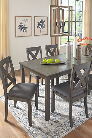 Perfect portion. Striking a simply chic pose, the Caitbrook dining set is styled with fascinating flair. Subtle gray wash finish gives the clean-lined design a casually cool sensibility, while the chair’s plushly cushioned seat in a soft, neutral upholstery adds to the allure.Includes dining table and 6 chairs | Table made of wood, acacia veneer and engineered wood; chairs made of wood | Antiqued gray wash finish | Foam cushioned seat with linen-weave polyester upholstery | Nailhead accents | Assembly required | Estimated Assembly Time: 60 Minutes
