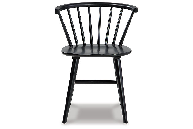 Sleek and simple, the solid black finish of the Otaska dining chair is sure to impress. With a low spindle back and turned legs, this chair proves minimalism can make a big statement. Made with solid wood | Solid black finish | Low spindle back | Turned legs | Sturdy "H" stretcher | Assembly required | Estimated Assembly Time: 30 Minutes