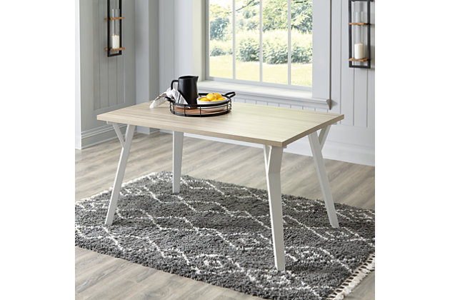 Bring light to your dining area with clean lines and a bright two-tone finish. The Grannen rectangular dining table sports stylized saber legs in a white finish for beautiful simplicity. The melamine top in a light tan color provides additional durability, marrying minimalism with big style for a delightful combination. Made with solid wood | Melamine top with replicated exotic wood grain in light tan, natural wood coloration | Base with white finish | Saber legs | Assembly required | Estimated Assembly Time: 30 Minutes