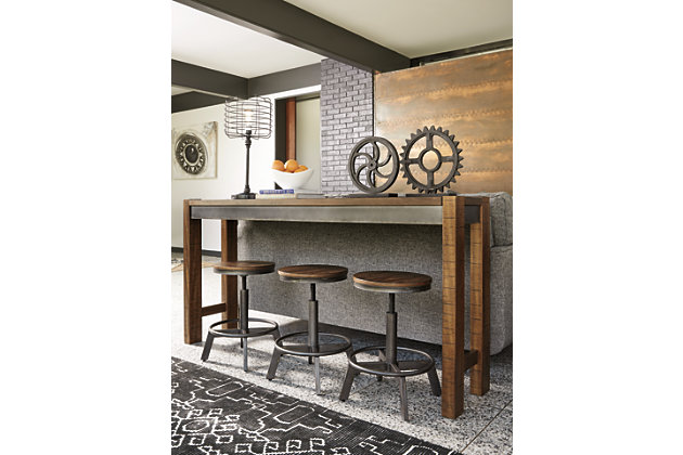 Make your home the hub for cool vibes with the Torjin stool. Two-tone finish scheme of distressed warm brown and aged gunmetal is full of urban industrial swagger. Adjustable height is accommodating for you and your guests. Add it behind your sofa with the Torjin long counter table for a dapper eating or working space.Made of veneers and engineered wood | Metal base | Adjustable height | Assembly required | Excluded from promotional discounts and coupons | Estimated Assembly Time: 30 Minutes