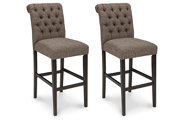 Tripton tall bar stool arrives at the table with full scale comfort. Classic tufting dresses up the beautifully curved back. Both seat and back are firmly cushioned and covered in a graphite textured upholstery.Seat and back covered in polyester, linen-textured upholstery | Wood frame | Assembly required | Estimated Assembly Time: 30 Minutes