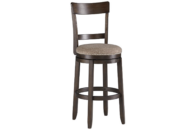 Raise the bar on modern farmhouse style with the Drewing upholstered swivel bar stool. Its clean-lined good looks are accentuated with a comfortably curved backrest and plushly upholstered seat with textural upholstery. Its wire-brushed finish infuses a relaxed, rustic sense of ease.Made of veneers, wood and engineered wood | Distressed, wire-brushed finish | 360-degree swivel | Polyester upholstery over foam cushioned seat | Nailhead trim | Assembly required | Estimated Assembly Time: 30 Minutes