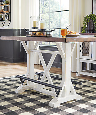 A high-style choice for smaller spaces, the Valebeck counter height dining table serves up the best in rustic farmhouse living. Two-tone finish pairs a brown tabletop with a distressed vintage white base for a double helping of charm. Black metal foot rests add such a distinctive twist.Made of pine wood, veneers and engineered wood | Two-tone finish | Black metal footrest | Assembly required | Estimated Assembly Time: 30 Minutes
