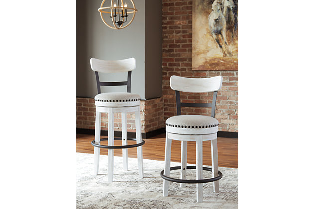 A touch of rustic-industrial style is such a fashion-forward choice, and the Valebeck barstool doesn’t disappoint. Set this tall barstool by the kitchen bar for a visually intriguing mix of new and old.Made of black finished metal; wood and engineered wood | Vintage white finish | Cushioned seat with linen colored polyester upholstery | Smooth 360-degree swivel | Nailhead trim detail | Assembly required | Estimated Assembly Time: 15 Minutes