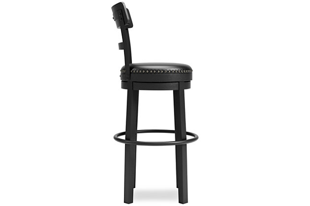 Bring a dash of drama to a kitchen island, table or counter with the Valebeck upholstered swivel bar stool. The sturdy wood frame with contoured backrest is beautified with an antiqued black finish that’s a welcome change from the everyday ordinary. For your comfort and convenience, the bar stool seat is covered in a durable black faux leather designed for easy cleanup. Nailhead trim and metal accents perfect the aesthetic of this head-turning bar stool with 360-degree swivel.Made with solid wood | Antiqued black finish | Durable black faux leather over foam cushioned seat | Smooth 360-degree swivel | Nailhead trim | Beautifully accommodates modern farmhouse and contemporary spaces | Assembly required | Estimated Assembly Time: 15 Minutes