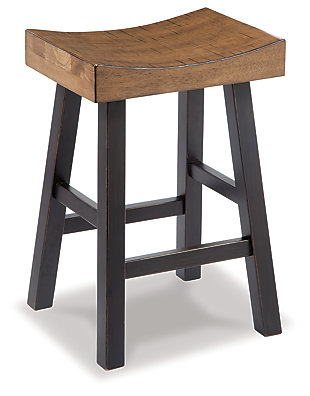 Saddle up and prepare to feast in total comfort and style. Glosco counter height saddle stool's deeply scooped seat offers ample support through multiple courses (or rounds of drink). Contrasting finishes elevate the classic shape, creating a look that keeps you coming back for seconds.Made of wood | Distressed finish | Comfortable footrest | Counter height | Assembly required | Excluded from promotional discounts and coupons | Estimated Assembly Time: 30 Minutes