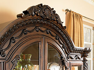 Inspired by the grandeur and grace of Old World traditional style, the North Shore china cabinet is nothing short of stunning. A choice blend of materials is accented by the most intricate carvings and appliques. Designed for modern convenience, the illuminated hutch with mirrored back and glass shelves makes for gorgeous displays.Made of veneers, wood, engineered wood and cast resin | Hand-finished | Antiqued goldtone hardware | Hutch with 2 glass doors and 3 shelves; LED lighting (3-way switch located on outer door hinge controls the light) | Assembly required | Upper cabinet only; buffet sold separately | Excluded from promotional discounts and coupons