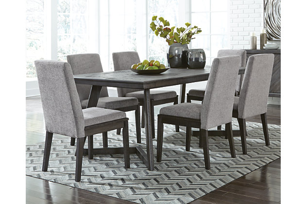 Revive and refresh your room with the Besteneer 7-piece dining room set. Dark charcoal gray wood finish is punctuated with natural distressing. The set showcases a truly modern aesthetic with a fashion-forward sculptural design. Swank gray upholstery and extended chair back design make for a unique seat with plenty of contemporary appeal. Tapered back legs are slightly flared for sturdy, stylish support.Set includes dining table and 6 upholstered dining chairs | Table made of wood, veneer and engineered wood | Chairs made of wood | Polyester upholstered foam cushion back and seat | Seats up to 6 | Assembly required | Estimated Assembly Time: 180 Minutes