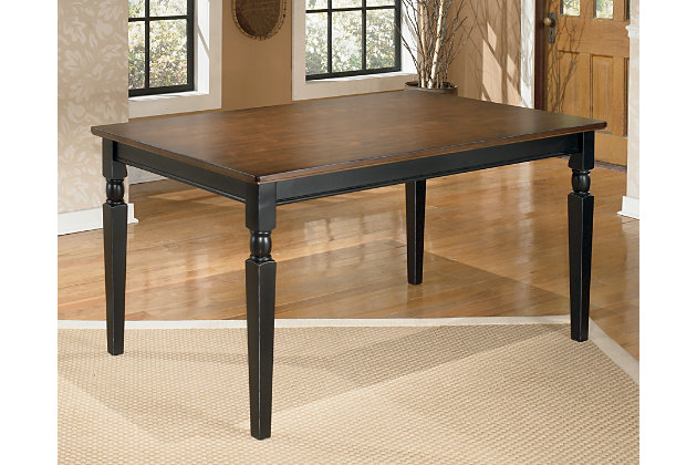 The farmhouse table is more in style than ever—and the Owingsville 5-piece dining room set brings it back in brilliant fashion. The rectangular table and 4 chairs don a subtle two-tone finish for a look that's equally homey and sophisticated. Vintage inspiration at its best.Includes dining table, 4 chairs  | Table and chairs made of veneers, wood and engineered wood | Table top and chair seats are finished in a burnished brown color | Table bases and chair frames are finished in cottage black paint | Assembly required