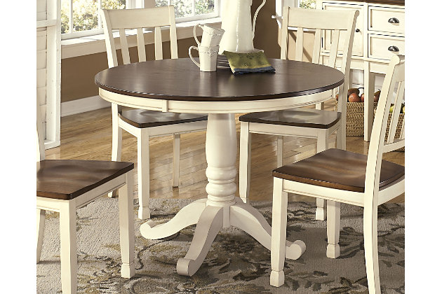 Incorporate cottage-cool warmth in your dining space with the Whitesburg round dining room table with classic pedestal base. A two-tone finish serves up twice the charm and character.Made of veneers, wood and engineered wood | Two-tone finish | Seats up to 4 | Assembly required | Excluded from promotional discounts and coupons | Excluded from promotional discounts and coupons | Estimated Assembly Time: 5 Minutes