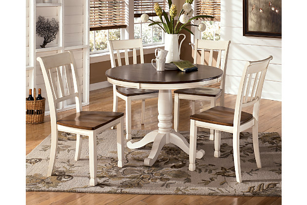 Incorporate cottage-cool warmth in your dining space with the Whitesburg 5-piece dining room set. The round dining table with classic pedestal base and four rake back chairs with two-tone finish serve up twice the charm and character.Includes dining table and 4 chairs  | Cottage white and brown two-tone finish | Table made of veneers, wood and engineered wood | Chairs made of wood and engineered wood | Assembly required | Estimated Assembly Time: 5 Minutes