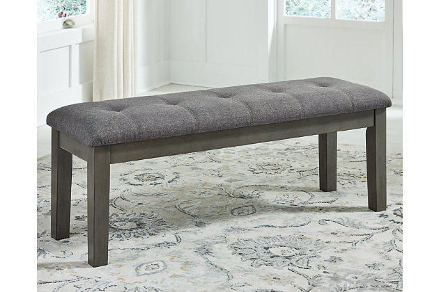 Cool and on-trend. The Hallanden dining bench sports a two-tone gray look for a contemporary-yet-casual feel. The cushioned foam seat in a gray textural fabric pairs seamlessly with the antiqued gray finish, providing you with a super-stylish and versatile seating option.Made with solid wood | Antiqued gray finish | Upholstered in gray textural polyester fabric | Cushioned foam seat | Assembly required | Estimated Assembly Time: 15 Minutes