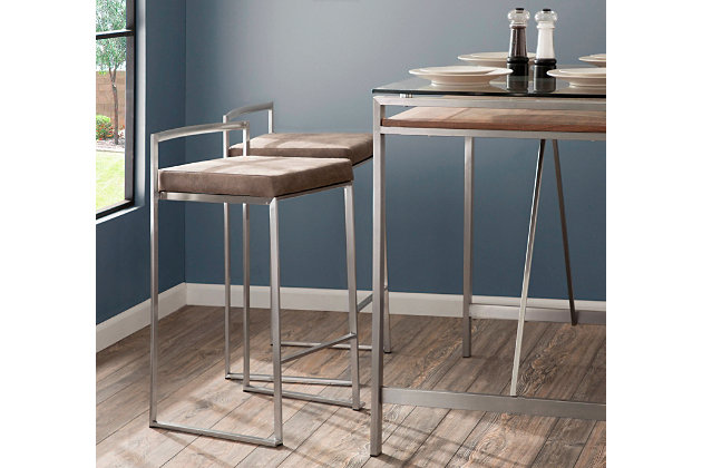 Longing for a less-is-more aesthetic? Get it all with a pair of streamlined bar stools. A luxe finish lets the ultra-linear metal frame and backrest shine. Thickly padded seats are covered in rustic looking fabric for a cool look and sumptuous comfort. Stackable design simply makes sense.Set of 2 | Made of metal | Stainless steel finish | Foam cushioned seat | Polyester upholstery | Sturdy metal footrest | Stackable design | Assembly required