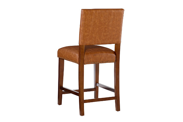 Raise the bar on style with this upscale upholstered bar stool. Brown wood frame is a stri contrast to the black faux leather upholstery that's a smart choice for low-maintenance living. Thickly padded seat caters to your comfort level.Made of wood | Brown finish | Black vinyl upholstery | Foam cushioned seat | Protective glides under legs | Assembly required