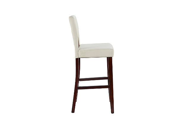 Raise the bar on style with this simply striking upholstered bar stool in espresso with white upholstery. Thickly padded seat and back covered in easy-clean vinyl caters to your comfort level.Made of wood | Espresso finish | Faux leather seat and back upholstery with foam padding | Cut-out back for easy sliding | Footrest | Protective glides under legs | Assembly required