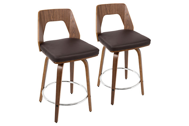 Equal parts form and function, this barstool is as much of a place to sit as it is a work of art. Blending walnut and natural wood tone finishes, the “bent” base has a highly modern, sculptural feel, as does the cutout style backrest. Covered in a chocolate faux leather, the thickly cushioned seat makes comfort a beautiful thing.Set of 2 | Made of wood with walnut finish | Cushioned seat with black faux leather upholstery | Footrest in contrasting chrome-tone metal for added support | Assembly required
