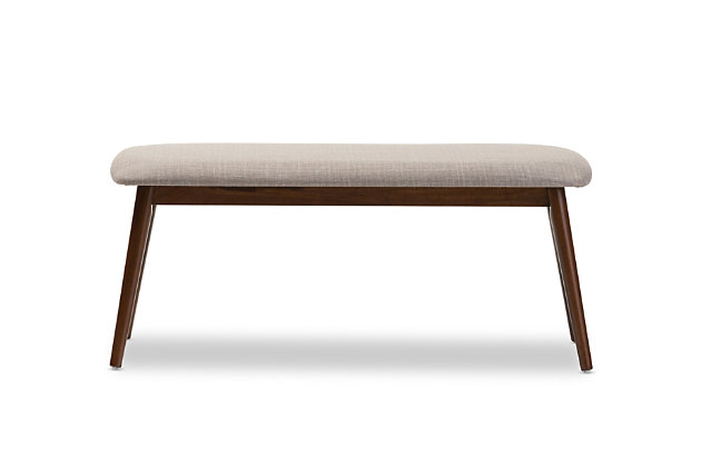 Minimalist and refined, this mid-century inspired bench is that “finishing touch” you’ve been longing for. Distinctive elements include canted legs, an earthy brown finish and a comfortably padded seat wrapped in a gorgeous gray textural fabric.Made of wood in walnut-tone finish | Gray polyester upholstery | Foam cushioned seat | Assembly required
