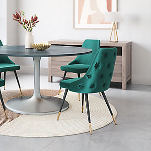 If fashion is your passion, then this sophisticated side chair is for you. Make a statement around your table, at your desk or in your entryway. Its tapered back with button tufting is easy on the eyes and gorgeous from every angle. Slim pencil legs include brushed brass-tone tips for a touch of elegance.Set of 2 | Made of solid steel | Velvet upholstery | Assembly required