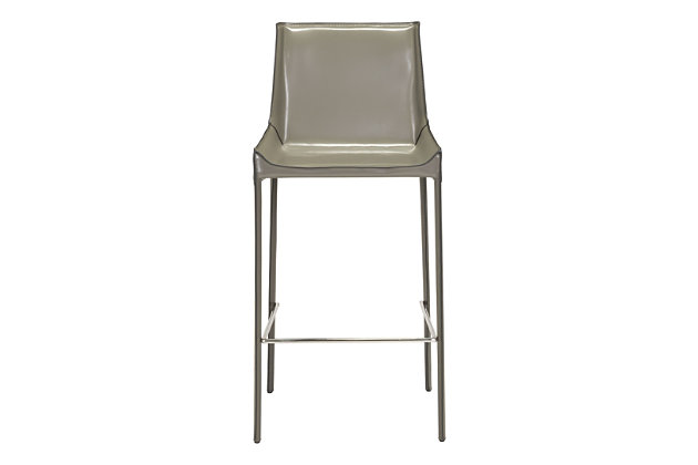 Streamlined and sleek, this bar stool features a slim profile with rich leather upholstery showcasing an exposed seam aesthetic stretching from high back to feet. Accented with sturdy chrome-tone footrest.Set of 2 | Sturdy steel base | Leather upholstery | Exposed seam details