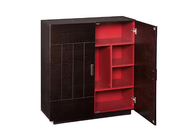 A swanky essential for the entertainer, this bar cabinet in dramatic black with red interior brings back cocktail hour in high style. Behind the double doors, you’ll find nine storage cubbies varying in size to store wine, liquor, glasses and whatever else you want to add to the mix. What a delicious addition to modern or mid-century inspired abodes.Made of engineered wood and veneer | Black finish with dramatic red interior | 2 cabinet doors | 9 storage compartments varying in size | Includes anti-tip hardware for stability | Assembly required | Assembly time frame is 45 to 60 min.