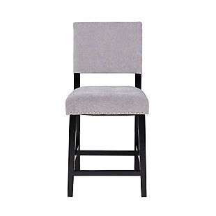 Transitional in style, the Wes Stool has clean lines and a smooth design. The black finished frame is accented by dark gray washed velvet upholstery and embellished with shiny silvertone nailheads. Footrails provide added stability to the sturdy wood frame. Counter height.Made of wood and mdf | Foam cushioned seat | Shiny silvertone nailhead trim | Footrails for stability | Seat height 24" | Black finish | Polyester (velvet) upholstery | Assembly required