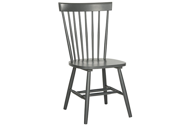 Inspired by the classic Windsor chair, the Robbin Chair (sold in a set of two) is updated with fresh colors for casual dining rooms and kitchens. Crafted with 100% Malaysian Oak in charcoal grey painted finish, it brings timeless, sculptural elegance to any space.Dust regularly with a soft, dry cloth. Never use oiled or treated cloths on lacquered finishes. Some finishes can be wiped with a damp (not wet) cloth, followed at once by rubbing with a dry cloth to remove fingerprints and smudges. For persistent spots, gently clean with a soft cloth and a solution of water and mild soap, make sure to wipe dry. Use adhesive felt pads, coasters and placemats to protect your furniture. | Sold as a set of two