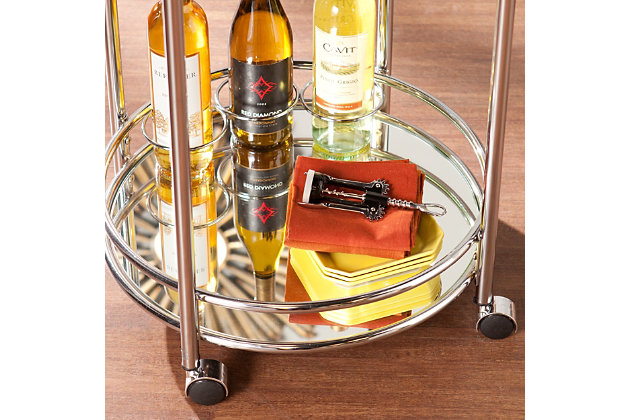Jazz up your entertaining resume with this high-shine, high-style bar cart. Its mirrored shelf and tabletop display appetizers and cocktail ingredients, while three bottle holders strut your favorite vintages. Casters let the good times roll.Made of iron in metallic chrome-tone finish | Mirrored shelf and tabletop | 3 wine bottle holders | 1920s-inspired silhouette | Assembly required | Assembly time frame is 15 to 30 min.