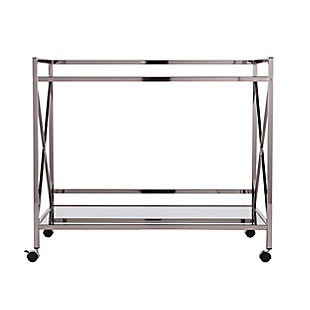 Conjure a scene a la Gatsby with this elegant bar cart. Sleek, linear architecture contrasts with the luxurious metallic chrome-tone finish, high-shine mirrored shelf and glossy glass tabletop. X-frame sides give a nod to the lavish lifestyles of the '20s, while two open shelves provide plenty of space for your martinis, stemware and garnishes. Designed to keep the party on a roll, this cart includes two safety casters that lock into place.Plated iron frame in metallic chrome-tone finish | 5-mm tempered glass top | 5-mm mirrored glass shelf | Locking casters for easy mobility/stability | Assembly required | Assembly time frame is 15 to 30 min.