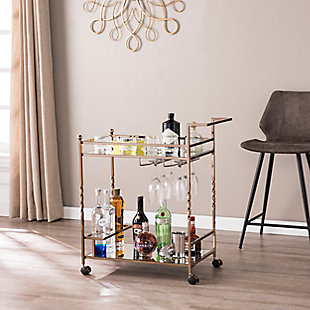 Stack up your style with this double-decker mirrored bar cart. Two mirrored shelves reflect your bar collection, while stemware racks and bottle holders keep your items easily accessible and neatly organized. A conveniently placed handle and smooth-gliding casters help keep the party on a roll.Plated iron frame in champagne finish | 5-mm mirrored glass top and shelf | 3 bottle holders | 2 stemware racks | Locking casters for easy mobility/stability | Assembly required | Assembly time frame is 15 to 30 min.