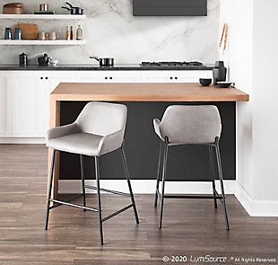 Add stylish and comfortable seating to your kitchen or counter area with the industrial charm of this counter stool. It features sleek faux leather upholstery, a padded seat and backrest, and a unique black metal frame.Set of 2 | Made of steel, vinyl leather, foam and birch | Padded seat and backrest with gray faux leather upholstery | Metal frame with black finish | Fixed counter height | Assembly required