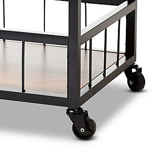 Featuring secure storage for bottles and glassware, the Cerne bar cart is a necessity for any wine connoisseur. This sturdy metal cart is equipped with a built-in wine rack to hold four bottles of your favorite wine. A built-in stemware rack provides storage for four of your finest wine glasses. Additional storage space is provided by two shelves and a removable tray, each crafted from rustic, dark oak-finished engineered wood. The rustic finish on the wood is paired with the black metal frame to give this cart a vintage industrial chic look. Designed with both aesthetics and function in mind, it's fitted with handles and wheel casters for smooth mobility. The Cerne bar cart is made in China and requires assembly.Black metal frame | Engineered wood shelves and tray with dark oak finish | Removable tray with handles | Wine rack holds 4 bottles | Wheel casters | Assembly required