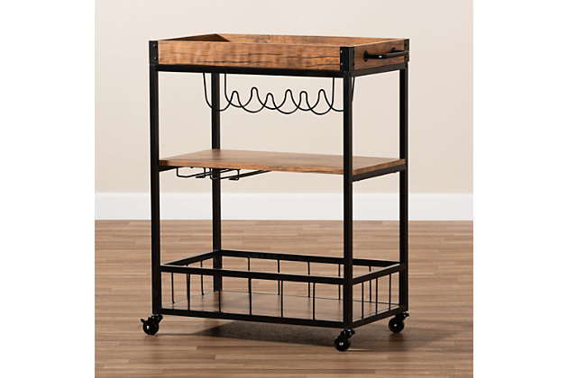 Featuring secure storage for bottles and glassware, the Cerne bar cart is a necessity for any wine connoisseur. This sturdy metal cart is equipped with a built-in wine rack to hold four bottles of your favorite wine. A built-in stemware rack provides storage for four of your finest wine glasses. Additional storage space is provided by two shelves and a removable tray, each crafted from rustic, dark oak-finished engineered wood. The rustic finish on the wood is paired with the black metal frame to give this cart a vintage industrial chic look. Designed with both aesthetics and function in mind, it's fitted with handles and wheel casters for smooth mobility. The Cerne bar cart is made in China and requires assembly.Black metal frame | Engineered wood shelves and tray with dark oak finish | Removable tray with handles | Wine rack holds 4 bottles | Wheel casters | Assembly required