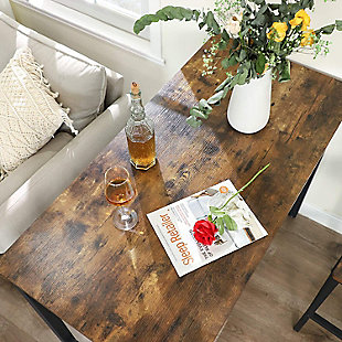 The Lynn Bar Table serves up ample room for your bar setup, so the ingredients you need are within reach. Roughly 4 feet long and about 2 feet wide, it's made of reclaimed wood and metal. It will impress your guests and show them you're serious about mixology, no matter what beverage goes into their glass. If you don't need it for shaking and stirring up libations, this versatile table could add a nice flair to any room. Imagine welcoming guests into your home with a colorful floral arrangement positioned on this rustic table in the entryway.Made of reclaimed wood and metal | Frame with matte black finish | Four legs for support and a crossbar for stability | Easy assembly