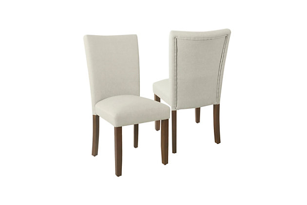 Available in a wide range of fabrics and finishes, this dining chair’s classic design combines with your individual tastes for a personal style statement. From stripes to geometric patterns, from dark blue to soft gray, your sense of style will be reflected in these sturdy wood-frame chairs. They will add flavor to your dining room, and are versatile enough to enhance almost any bedroom, entryway or living room.Set of 2 | Made of wood | Soft gray woven fabric upholstery | Padded seat and back | Assembly required
