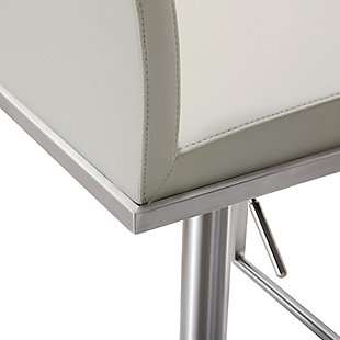 Furnish your kitchen or bar area in contemporary style with the Amalfi stool from TOV. The solid stainless steel frame provides a sturdy base, while the plush seat and footrest ensure maximum comfort. The combination of angles and gentle curves gives this stool an eye-catching appearance, while the neutral color allows it to match well with any decor.Stainless steel frame and footrest | Adjustable seat height with gas lift | 360° Swivel seat | Comfortable Vegan Leather upholstered back and seat | For residential or commercial use | Available in black, white or grey | Minor assembly required | Fabric swatch available