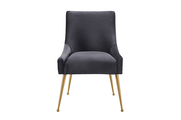 Sit pretty in this sumptuous yet durable velvet chair. The Beatrix dazzles as a dining chair or as an accent piece. Available in several colors with fab goldtone stainless steel legs and a matching handle on the back. Layer it in any room for a truly glamorous effect.Handmade elegantly curved design | Durable yet sumptuous velvet upholstery | Fab goldtone stainless steel legs | Goldtone handle on back | Solid kiln dried wood frame with webbing support | Assembly required