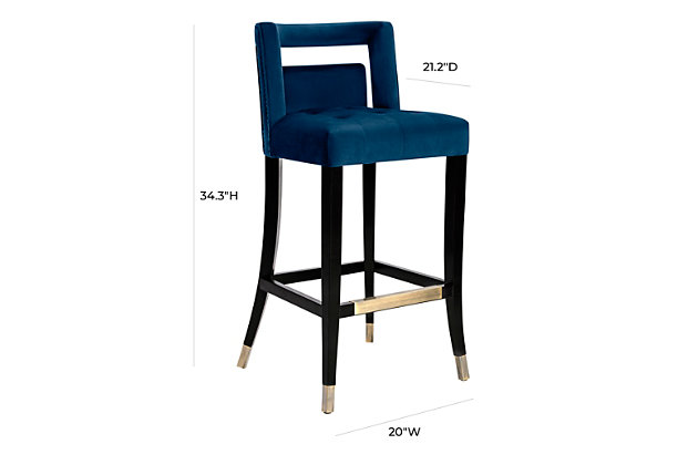Not for the faint of heart, these stools will make you swoon. Making their debut with a bold statement, the Hart stool is available in bar and counter height options, in your choice of sumptuous grey or navy velvet. Hand-applied nailheads and metal tipped legs match the accompanying footrest.Handmade by skilled furniture craftsmen | Individually hand-applied bronze-tone nailheads | Sumptuous velvet upholstery with tufted seat | Birch wood legs with bronze-tone steel caps | Matching steel footrest | Ships assembled