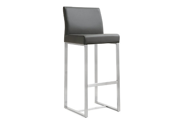 Furnish your kitchen or bar area in contemporary style with the Denmark bar stool from TOV. The solid stainless steel frame provides a sturdy base, while the plush seat and footrest ensure maximum comfort. The combination of angles and gentle curves gives this stool an eye-catching appearance, while the neutral color allows it to match well with any decor.Stainless steel frame and footrest | Comfortable Vegan Leather upholstered back and seat | Ships 2 per carton | For residential or commercial use | Available in black, white or grey and counter or bar height options | Fabric swatch available