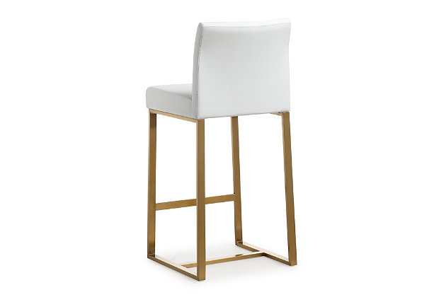 Furnish your kitchen or bar area in contemporary style with the Denmark counter stool. The goldtone solid stainless steel frame provides a sturdy base, while the plush seat and footrest ensure maximum comfort. The combination of angles and gentle curves gives this stool an eye-catching appearance and the neutral color allows it to match well with any decor.Stainless steel frame and footrest | Comfortable faux leather upholstered back and seat | For residential or commercial use | Available in black or white and counter and bar height options | Assembly required
