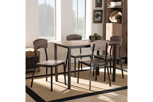 Smooth and functional, the Marcus dining set gives any dining space a relaxed, casual feel. Made in China, the Marcus set is adorned with wood finished in an oak brown and comfortably sits up to four. This dining set is supported by sturdy, black finished metal that complements the lighter tones of the wood. Assembly is required and a long, rectangular tabletop offers plenty of elbow room for each person. A unique fusion of metal and wood craftsmanship create a striking contrast that allows the Marcus to stand out as a fixture of the dining room.Dining set includes one (1) table and four (4) dining chairs | Oak Finished MDF wood | Black metal legs | Rectangular tabletop